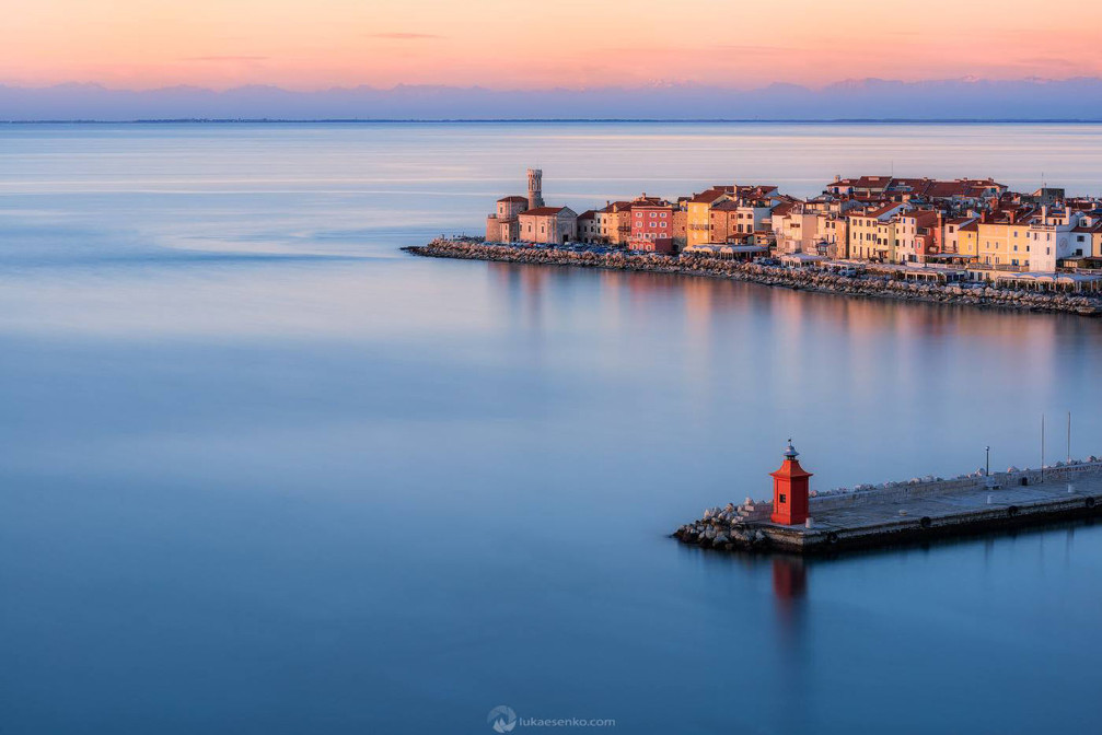 The charming coastal town of Piran basking in the evening light