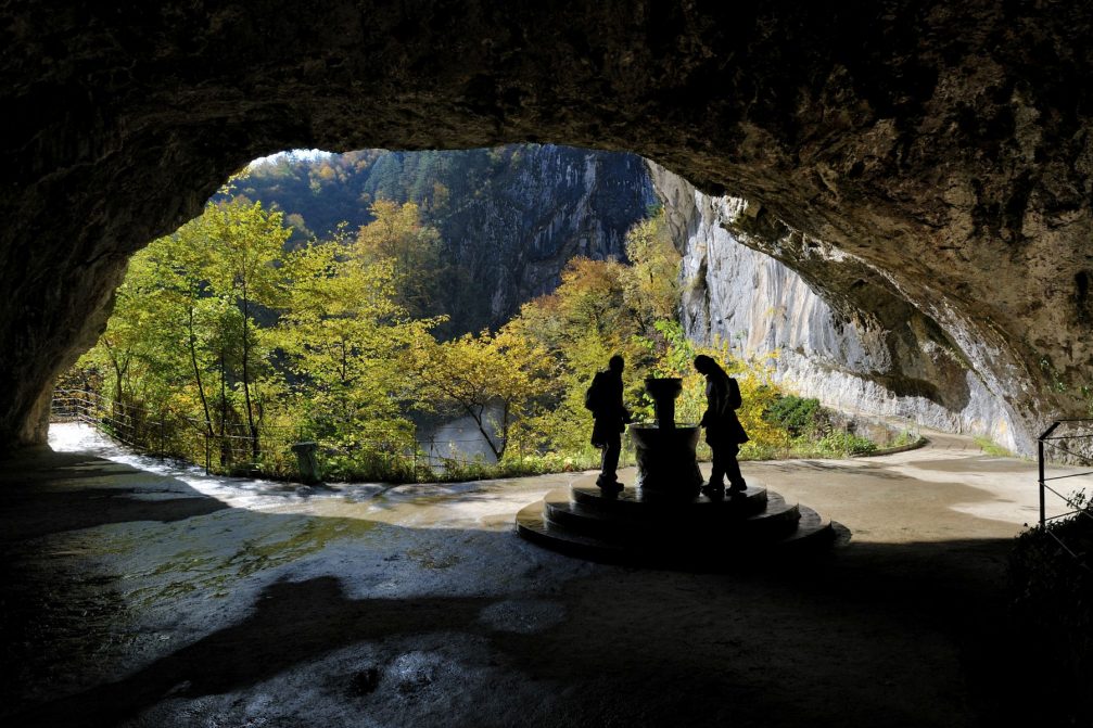 Entrance to Tominceva Jama cave with the Kraus Well