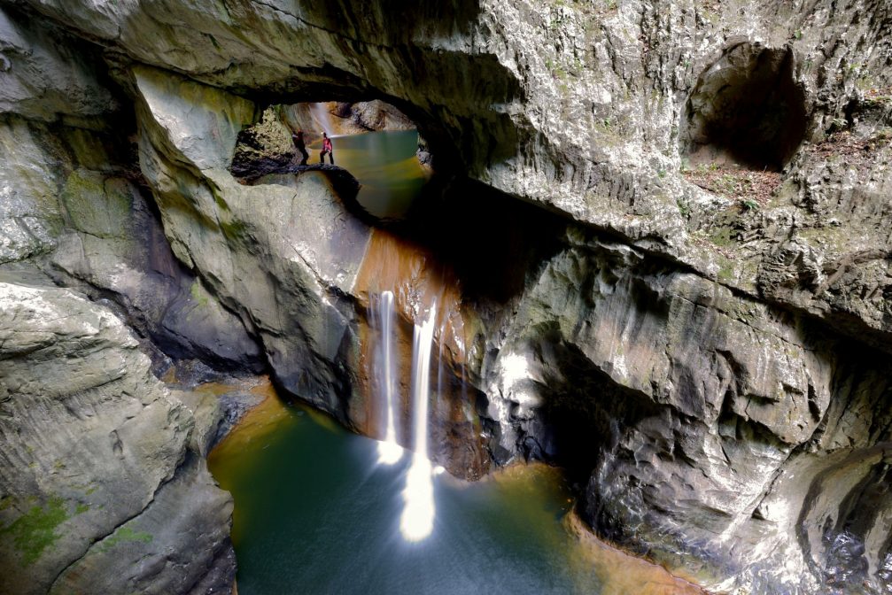 Waterfalls of the Reka river in the collapsed doline, before the river enters the underground canyon of Skocjan caves