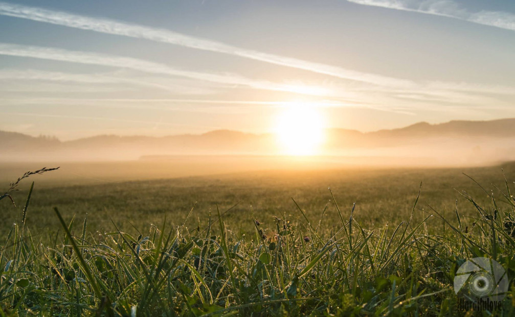 Sunrise on foggy morning in the Slovenian countryside