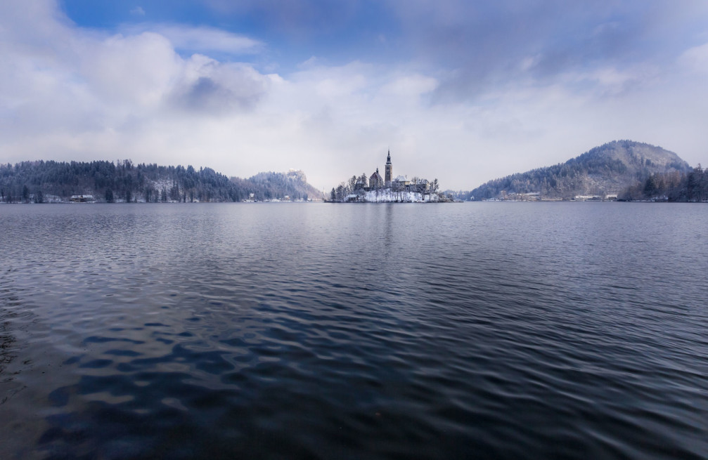 Bled Island with a white blanket of snow in winter