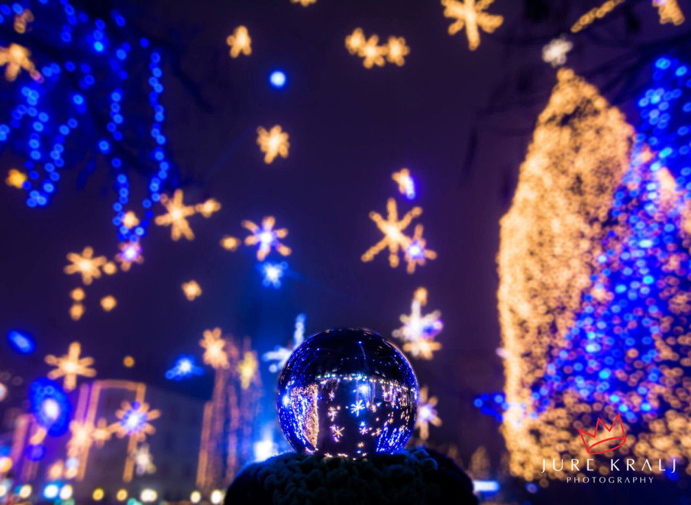 Christmas lights in Slovenia's capital Ljubljana celebrate science with geometric forms, math equations, galaxies, and planets