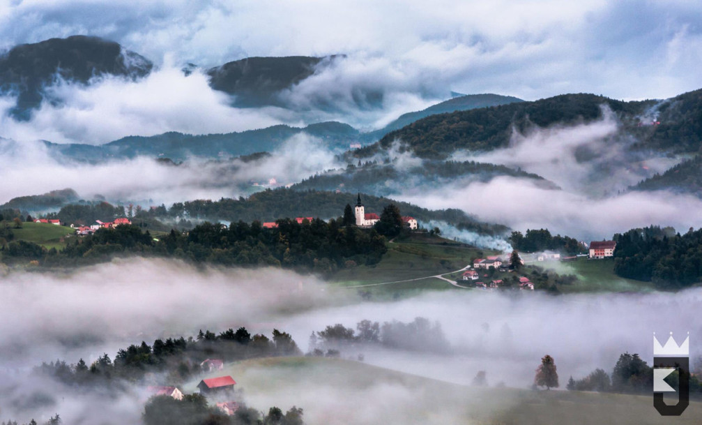 Landscape of the Loznica Hills and the Andraz nad Polzelo village with the St. Andrew's Church