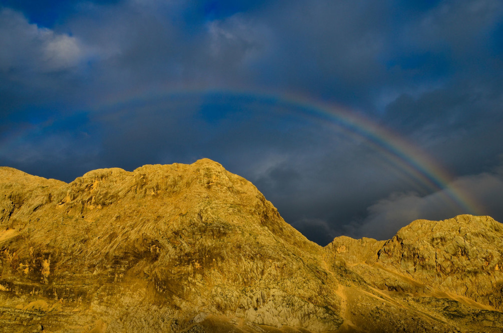 A rainbow captured by Gregor Skoberne on the Prehodavci saddle in the Julian Alps, Slovenia