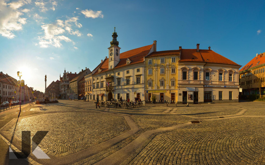 Main Square is Maribor, Slovenia, with the Plague Column monument and the Town Hall