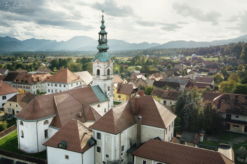 Aerial view of Braslovce , Slovenia with its Church of the Assumption of Mary