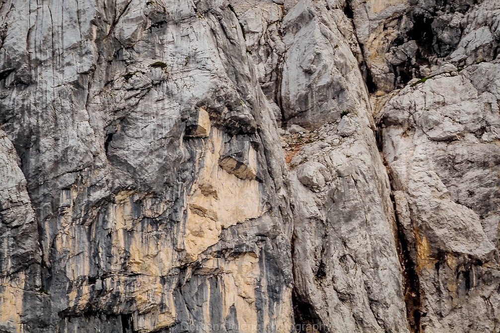 Cursed face of the Buckwheat girl in the Prisank north wall as seen from Vrsic, Slovenia