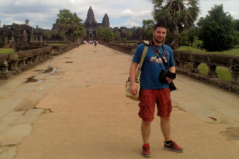 Slovenian travel photographer Domen Dolenc with his camera in his hands