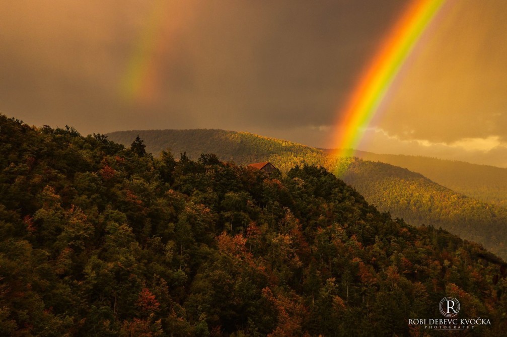 Double rainbow over the forest in the Vrhnika area in Slovenia