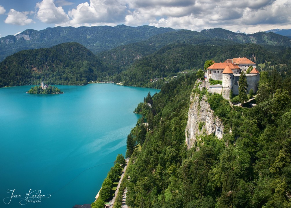Breathtaking aerial view of Lake Bled with its island and overlooking Bled Castle