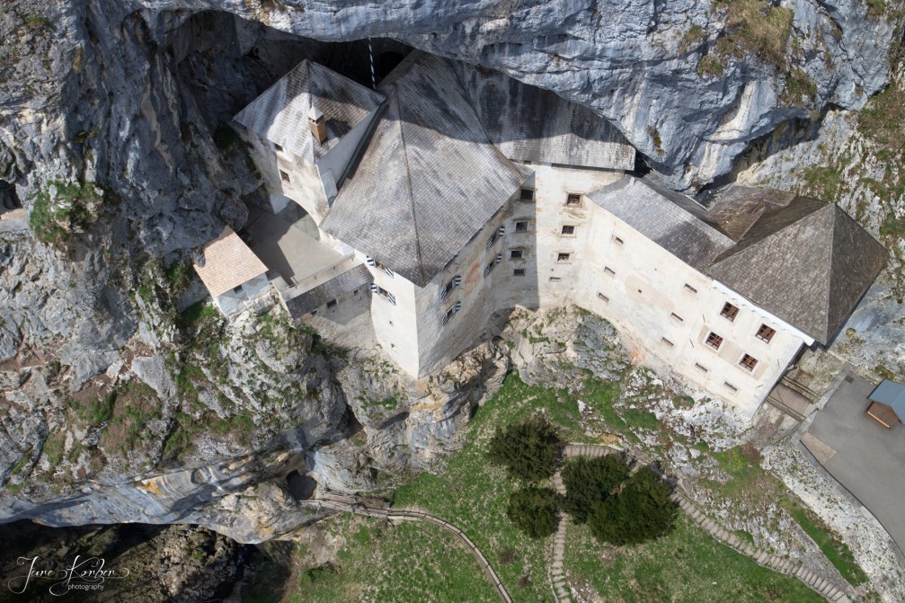A very unique aerial view of the historic Predjama Castle near the town of Postojna, Slovenia
