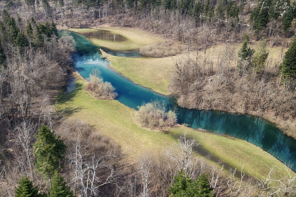 Aerial view of the Rak river flowing through the Rakov Skocjan landscape park near Cerknica, Slovenia