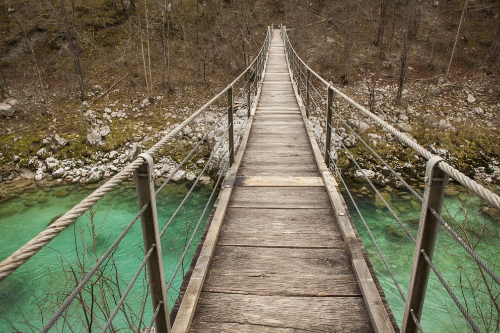 Footbridge over the Soca river located near the town of Kobarid, Slovenia