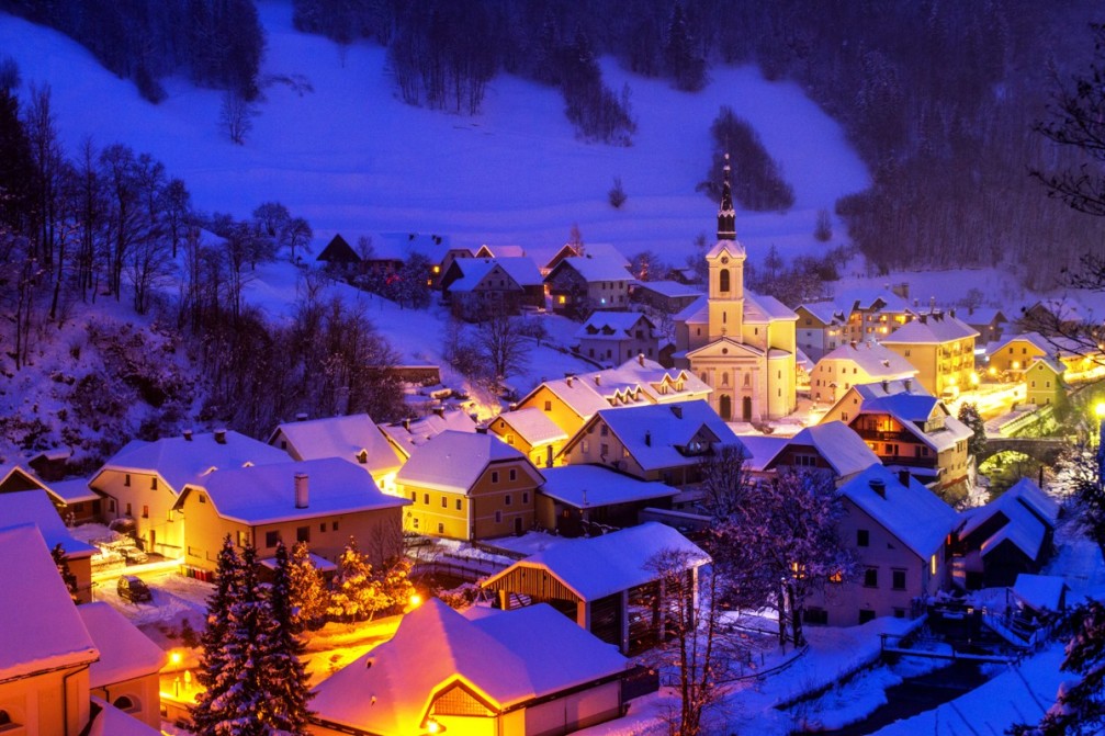 The tiny town of Zelezniki, Slovenia in winter with plenty of snow