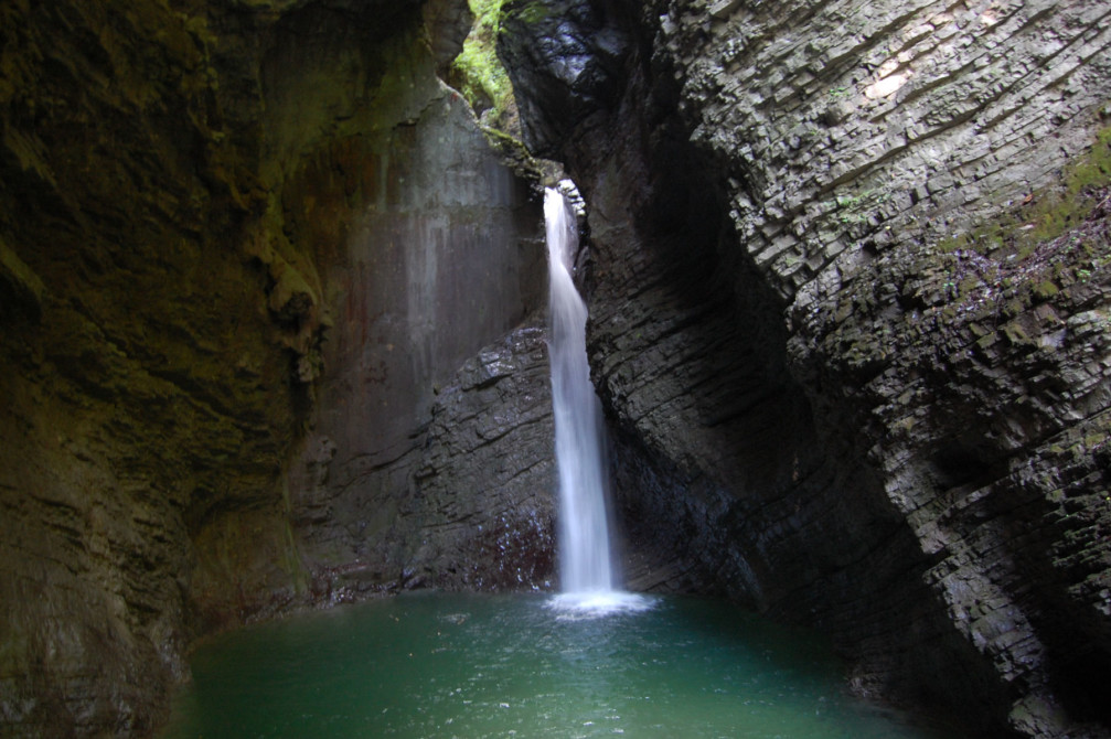 Waterfall Kozjak drops 15 meters into a beautiful emerald green pool