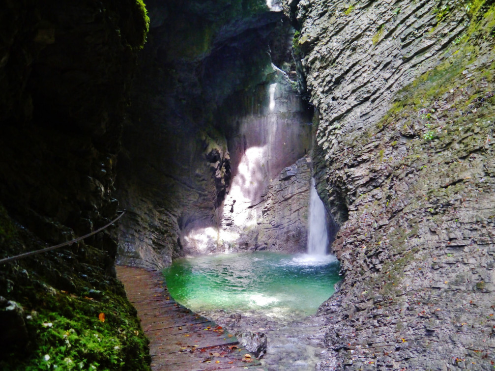 Waterfall Kozjak is hidden in a cave like chamber near the town of Kobarid, Slovenia