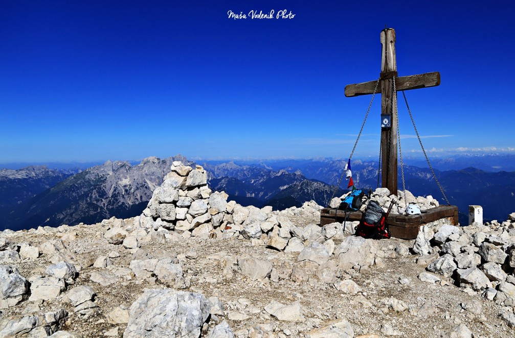 The cross on the summit of the Mangart mountain in the Julian Alps, Slovenia