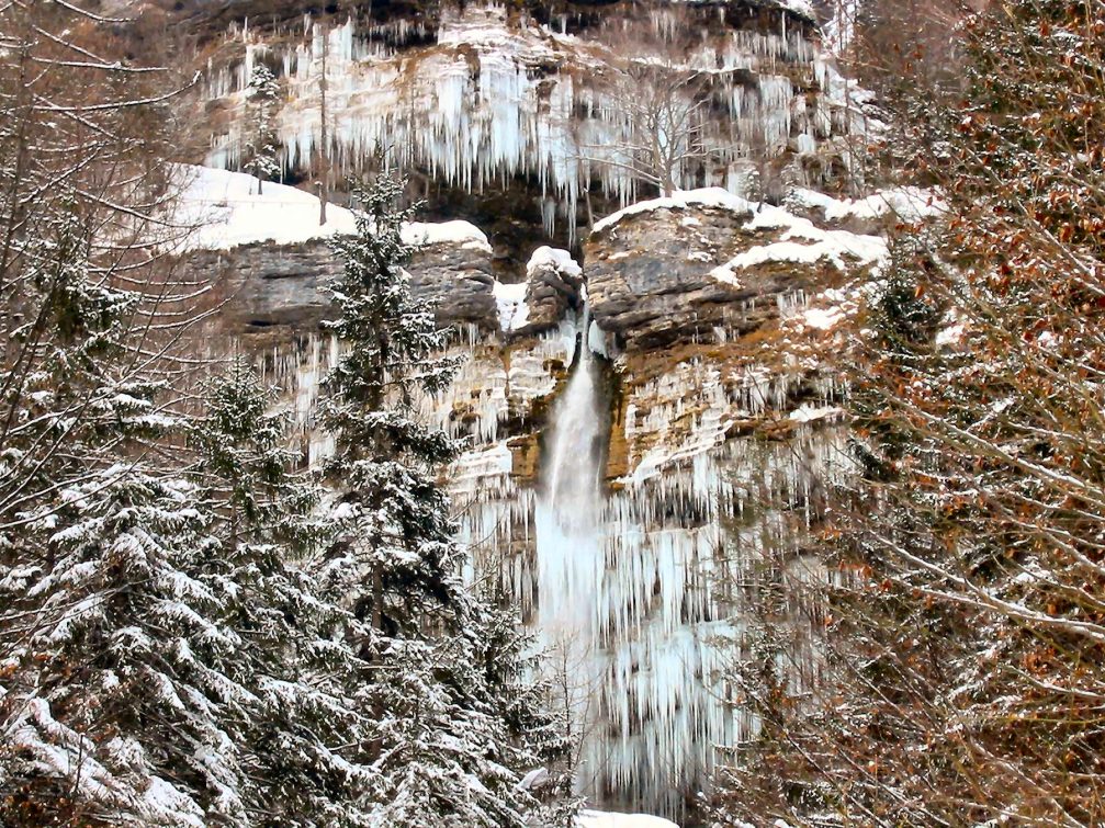 A unique view of the Pericnik waterfall frozen in winter