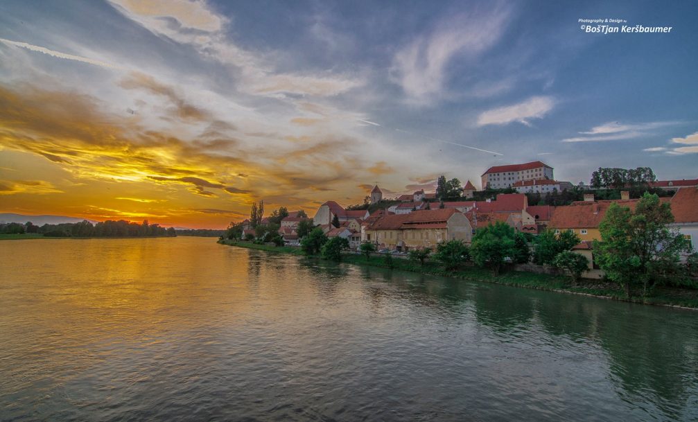 The town of Ptuj, Slovenia and River Drava at sunset