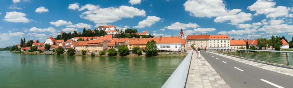 A panoramic view of Slovenia's oldest town Ptuj from the pedestrian bridge over River Drava