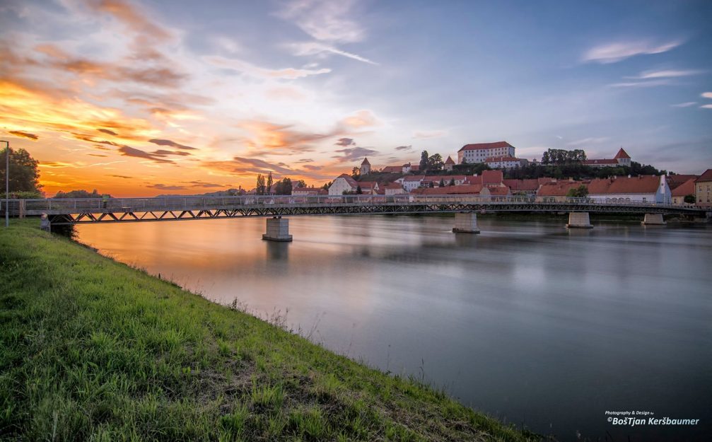 A view of the town of Ptuj with a bridge over the Drava river