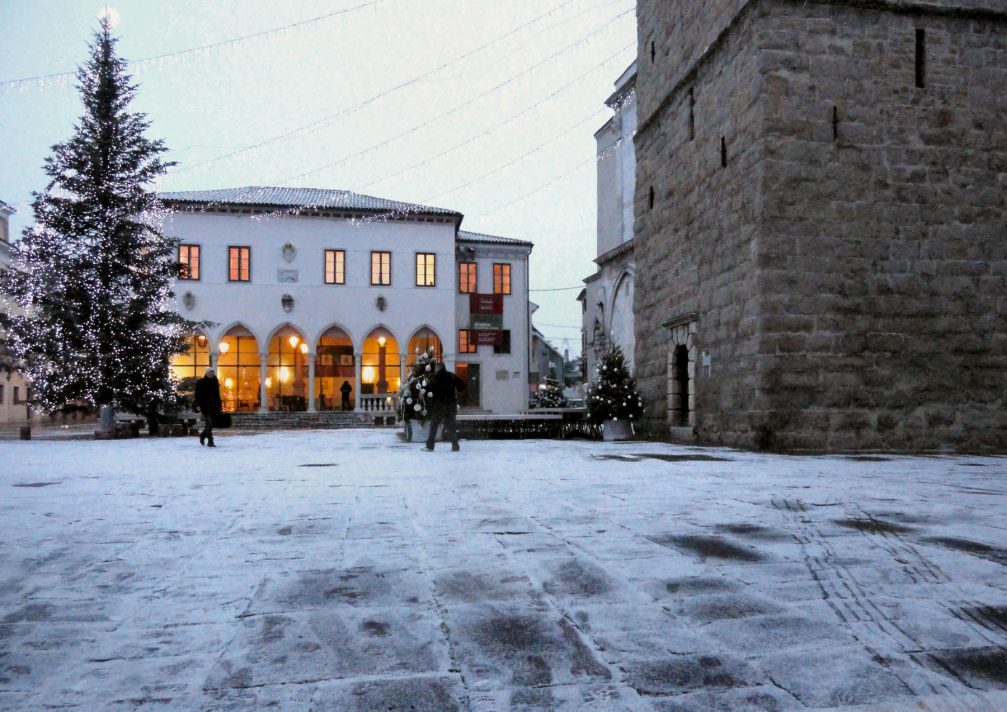 The Tito square in Koper decorated with a Christmas tree in winter during festive December