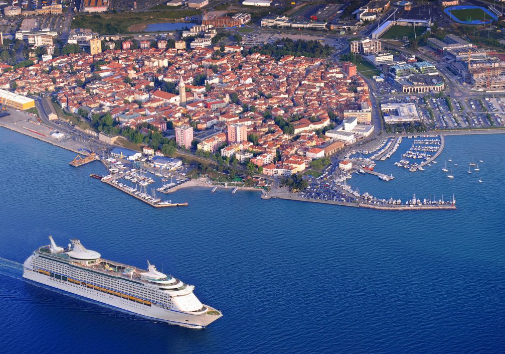 A beautiful aerial view of Koper with a cruise ship in front of the marina