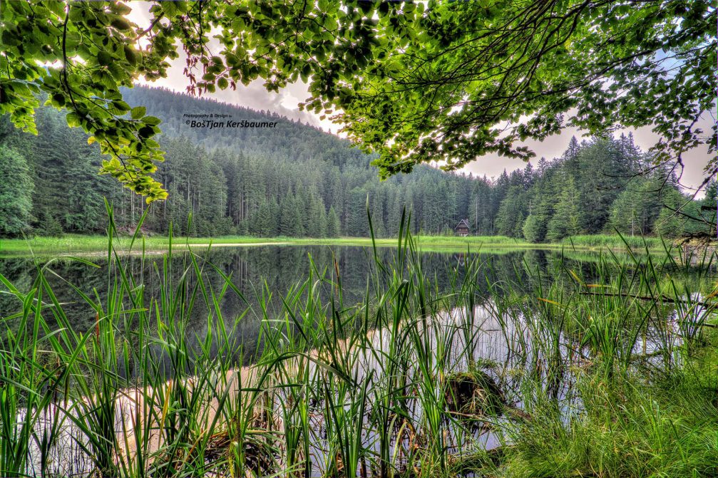 The scenic small Jezerc reservoir in the Pohorje Mountains in Slovenia