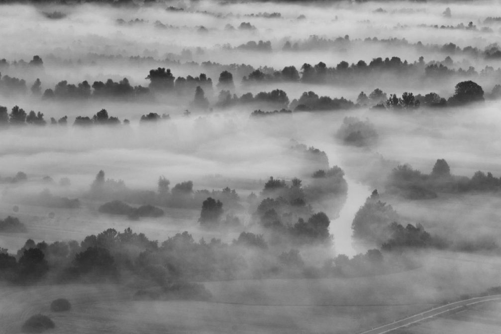 An elevated view of the Ljubljana marshes covered in fog from the St. Anne hill