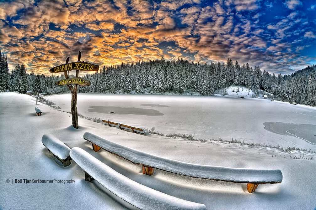Lake Odamovo Jezero in winter with lots of snow, Kapla na Kozjaku, Slovenia