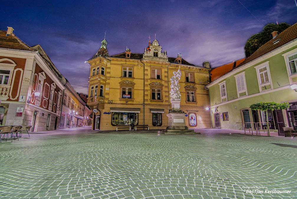 The beautiful Mestni Trg Square in the town of Ptuj, Slovenia, surrounded by interesting architectural buildings