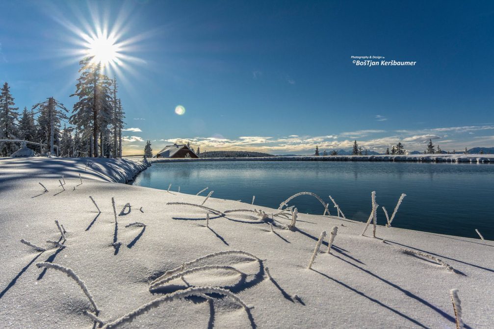 The lake above the Ribniska Koca mountain in central Pohorje ridge in winter