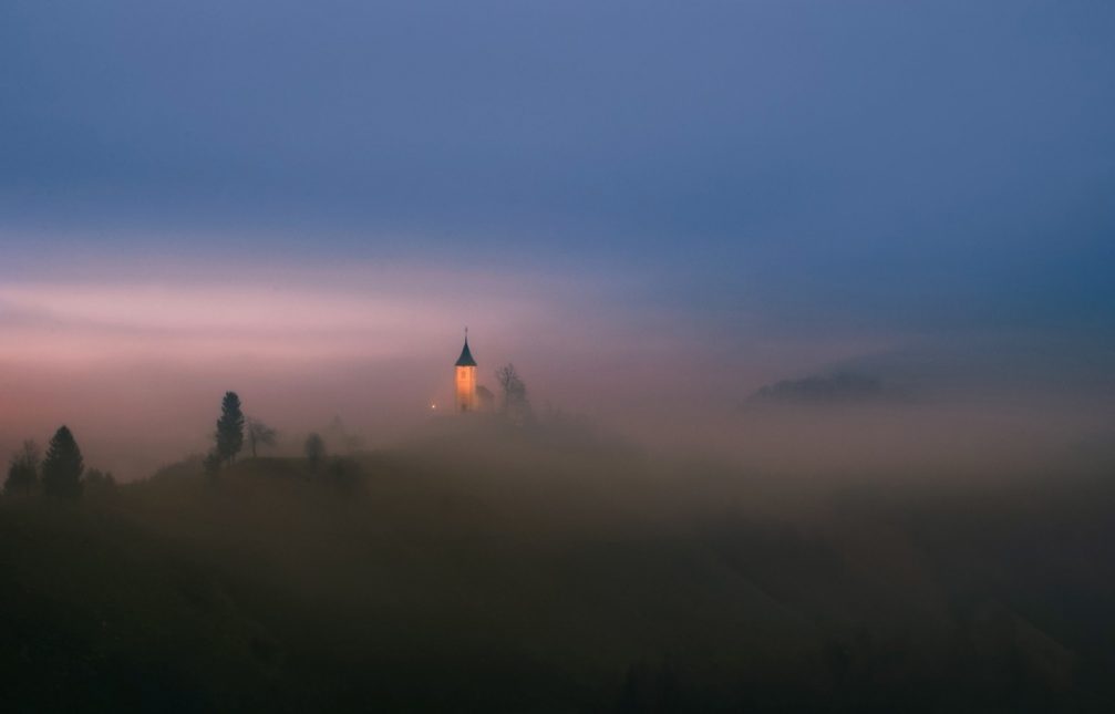 The illuminated beacon of the Jamnik church of Saints Primus and Felician in Slovenia