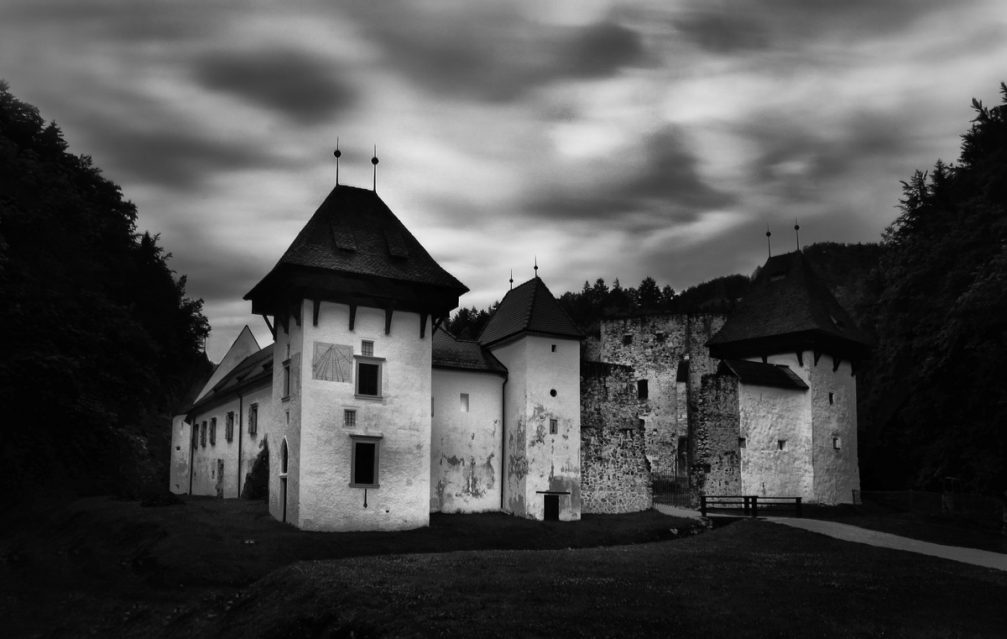 The exterior of the Zice Charterhouse in black and white