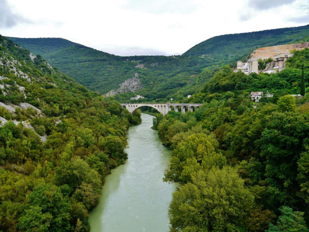 A more distant view of the Solkan Bridge over the Soca River in Slovenia