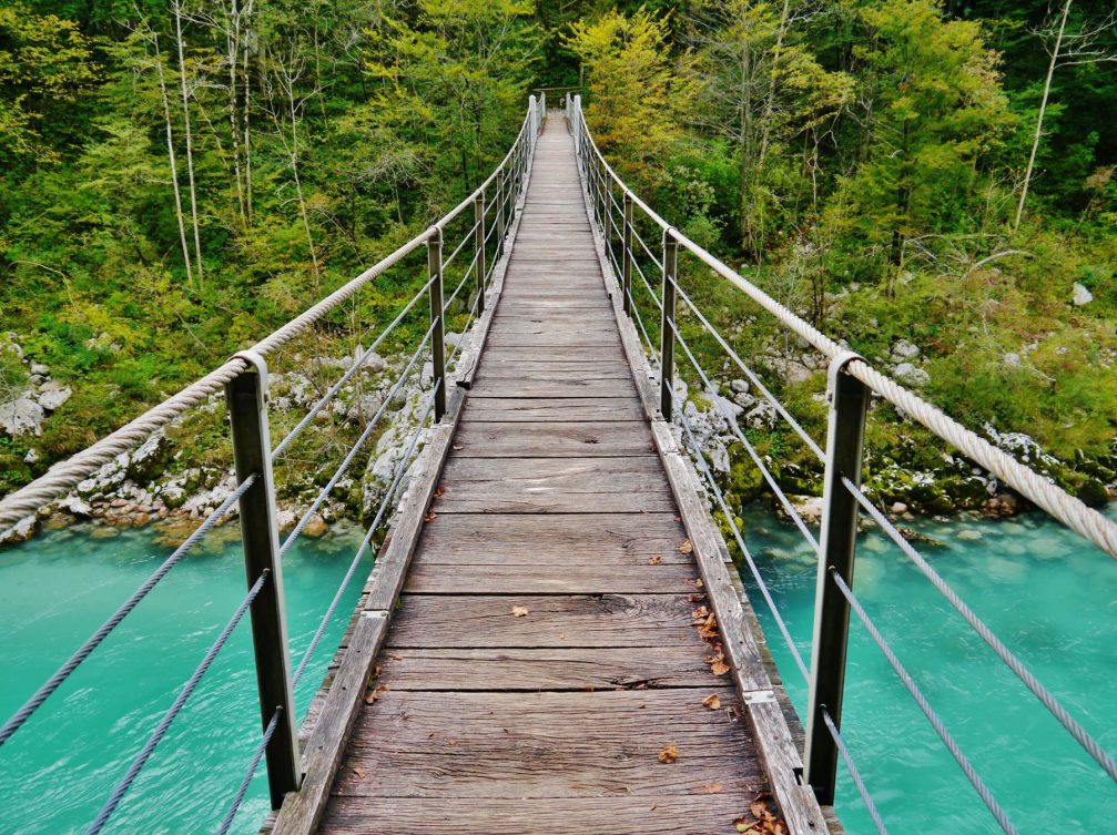 A suspension footbridge over the Soca river in the Triglav National Park in Slovenia