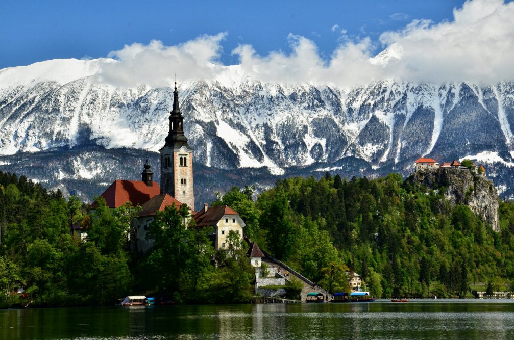 The medieval Bled Castle and the Church on the island in the middle of Lake Bled, Slovenia