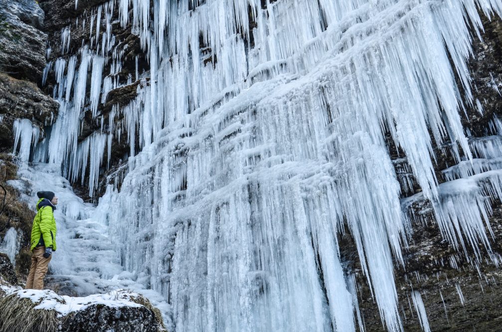Waterfall Pericnik frozen into beautiful icicles in the winter season