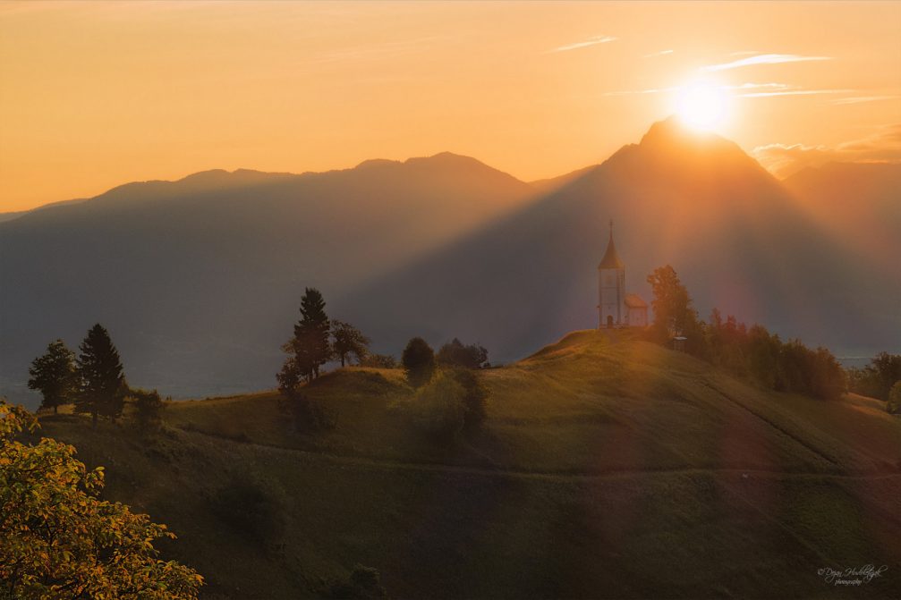 Catholic Church of Saints Primus and Felician, on the Hill at Sunrise in Jamnik, Slovenia