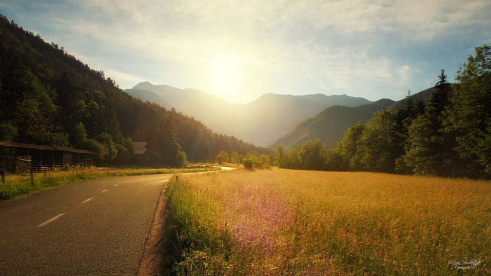 A blissful sunrise over the serene countryside of Kokra in northwestern Slovenia