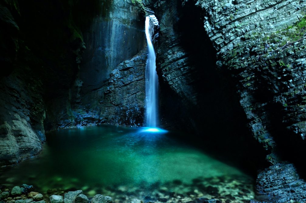 The 15-metre-high Kozjak Waterfall with an emerald green pool at is base