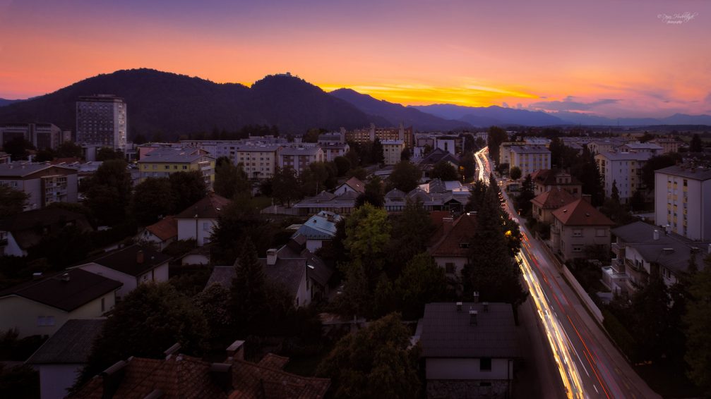 An elevated panoramic night view of the city of Kranj, Slovenia from the water tower