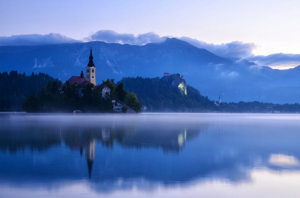 View of the Island and the Castle from the surface of Lake Bled in Slovenia