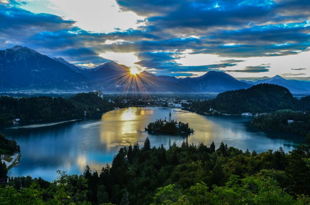 An elevated view of Lake Bled from the Ojstrica viewpoint at sunrise