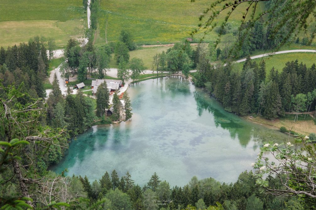 An aerial view of the heart-shaped Plansarsko Jezero Lake in Jezersko in Slovenia