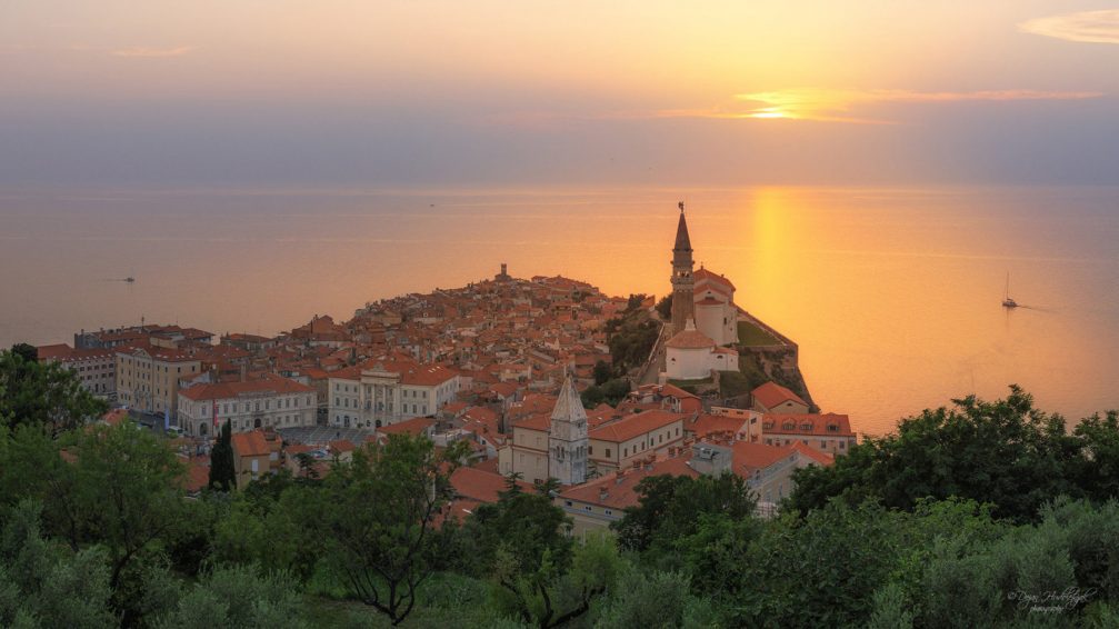 An elevated view of the coastal town of Piran, Slovenia from the town walls at sunset