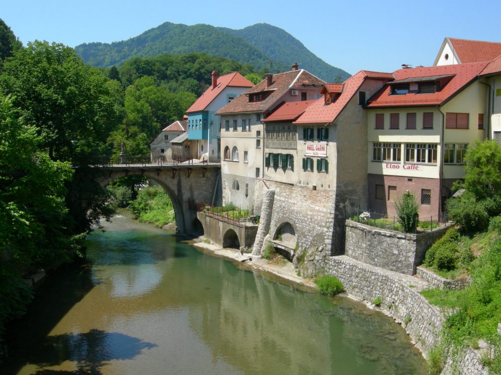 Picturesque historic houses built on river terraces of the Selska Sora river in Skofja Loka, Slovenia