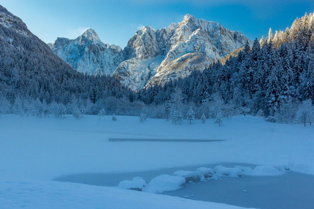 The frozen Jasna Lake in winter with lots of snow, Kranjska Gora, Slovenia