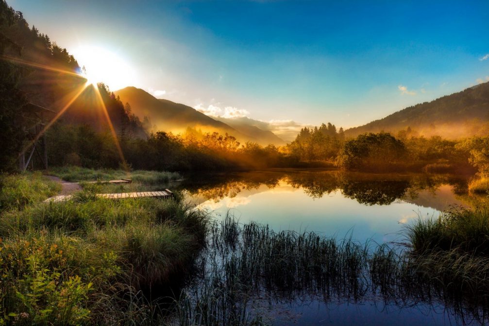 Sunrise over the Zelenci nature reserve in the Alpine area of northwestern Slovenia