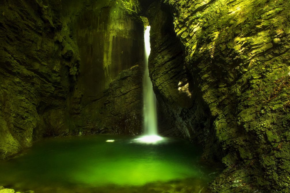 Kozjak Waterfall near Kobarid, Slovenia with an emerald pool at its base